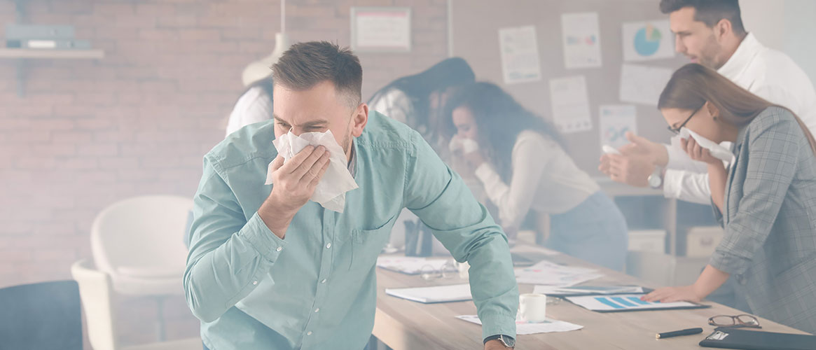 A group of coworkers starting to evacuate a burning office location.