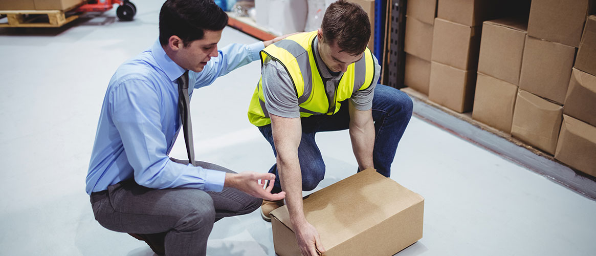 To help prevent back injuries, this worker receives training on how to lift properly